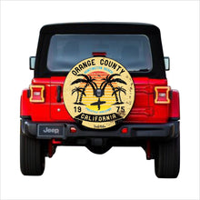 Load image into Gallery viewer, Universal tire cover &amp; wheel cover for Jeep Wrangler For models JL 2017-2019 with a rear camera - &quot;Orange County California Surf Rider&quot;