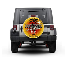 Load image into Gallery viewer, Universal tire cover &amp; wheel cover for Jeep Wrangler - &quot;Oceanside Surf Rider 1985&quot;